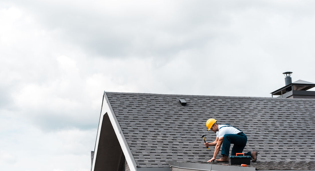 worker on a roof